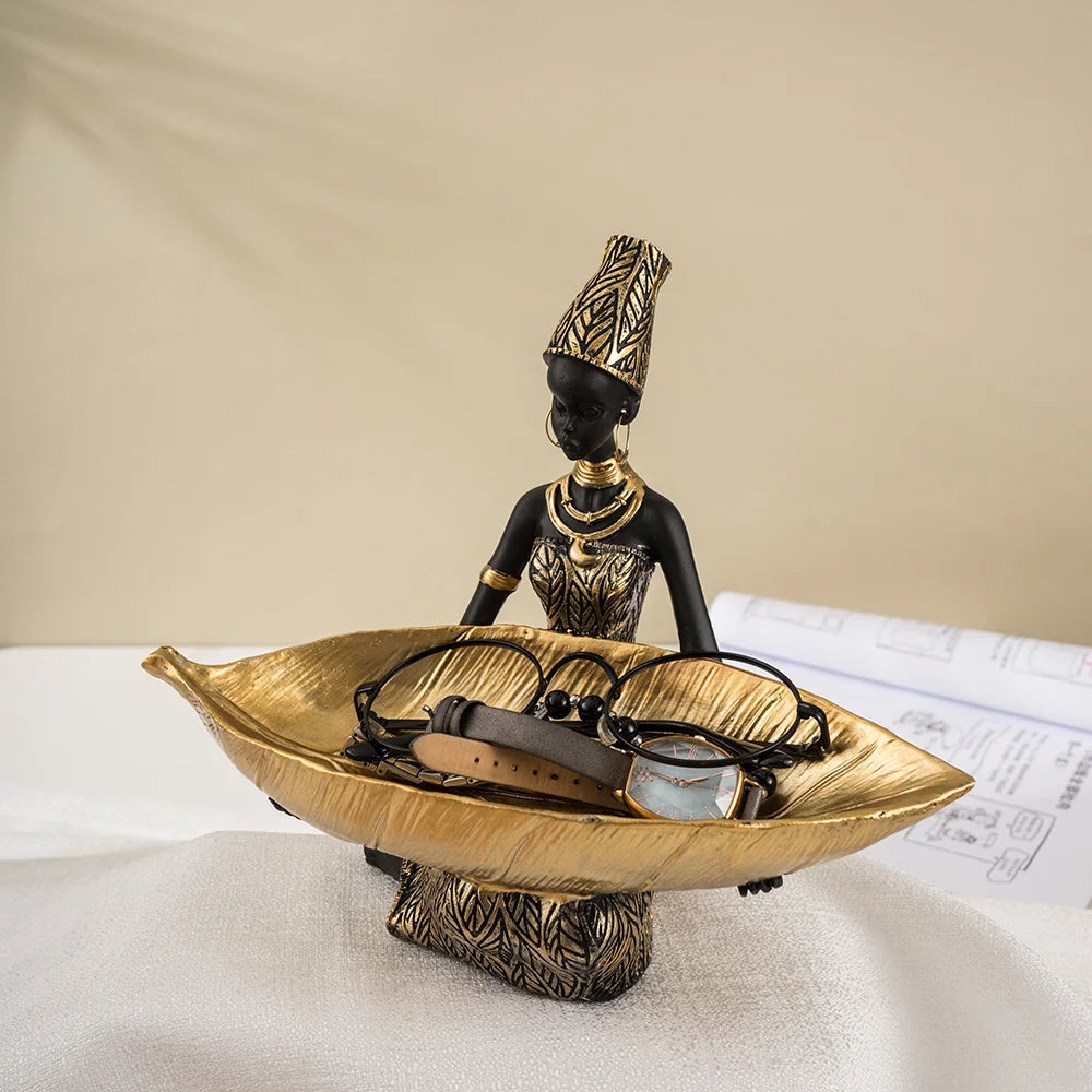 African Girl with Golden Plate – Elegant Decorative Sculpture
