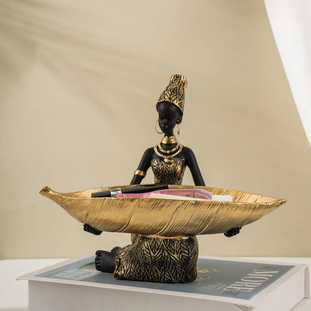 African Girl with Golden Plate – Elegant Decorative Sculpture