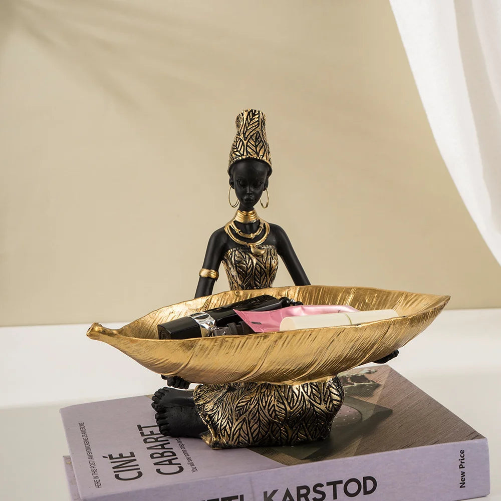 African Girl with Golden Plate – Elegant Decorative Sculpture
