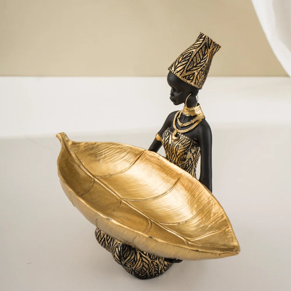 African Girl with Golden Plate – Elegant Decorative Sculpture