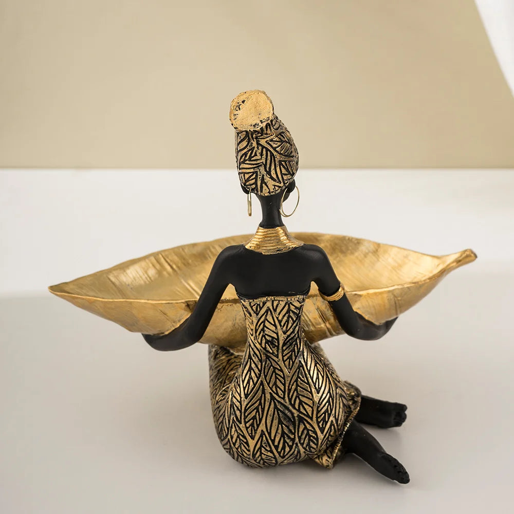 African Girl with Golden Plate – Elegant Decorative Sculpture