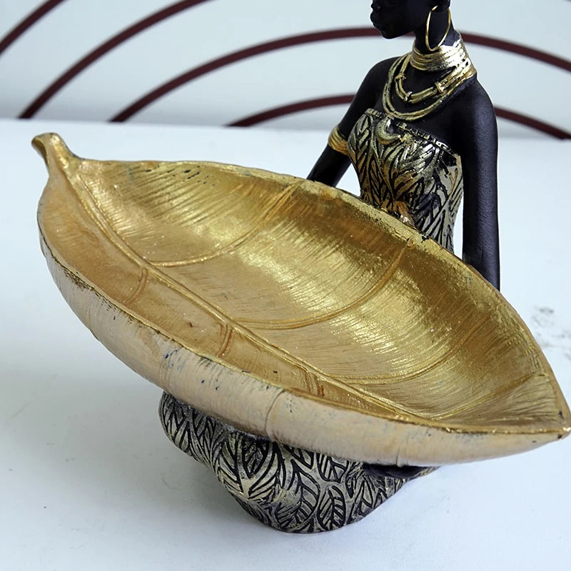 African Girl with Golden Plate – Elegant Decorative Sculpture