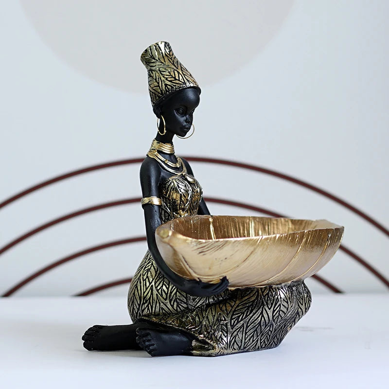 African Girl with Golden Plate – Elegant Decorative Sculpture