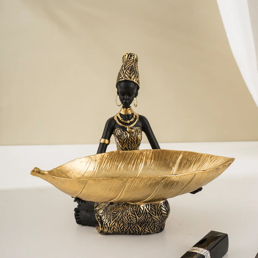 African Girl with Golden Plate – Elegant Decorative Sculpture