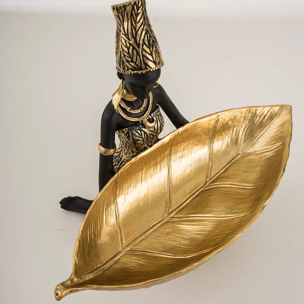 African Girl with Golden Plate – Elegant Decorative Sculpture