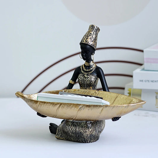 African Girl with Golden Plate – Elegant Decorative Sculpture