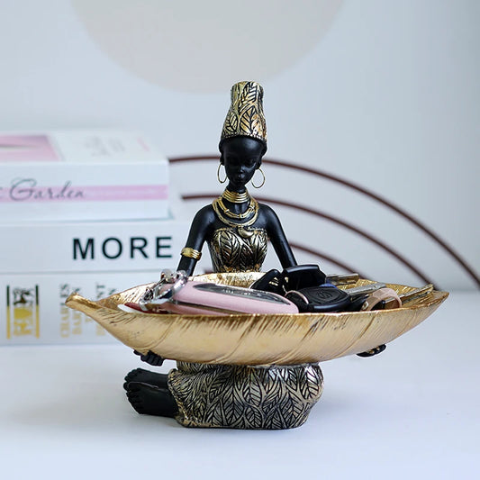 African Girl with Golden Plate – Elegant Decorative Sculpture